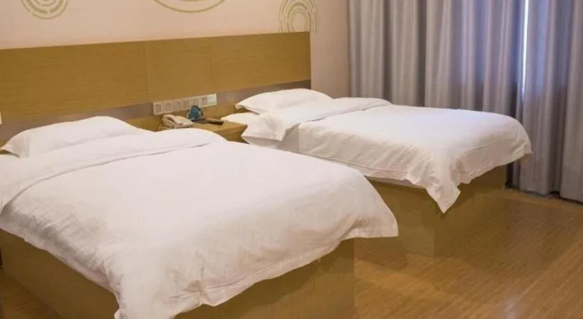 Bed in GreenTree Inn Qingdao Jiaozhou Jiaoping Road Express Hotel