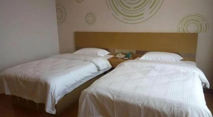 Bed in GreenTree Inn Qingdao Jiaozhou Jiaoping Road Express Hotel