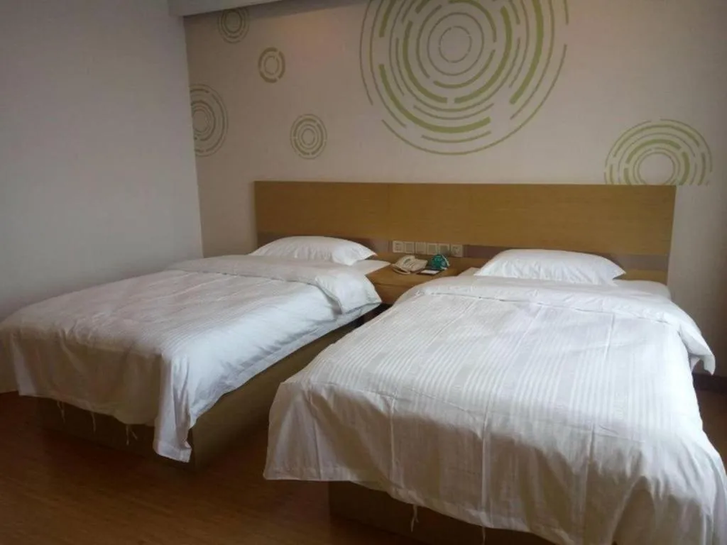 Bed in GreenTree Inn Qingdao Jiaozhou Jiaoping Road Express Hotel