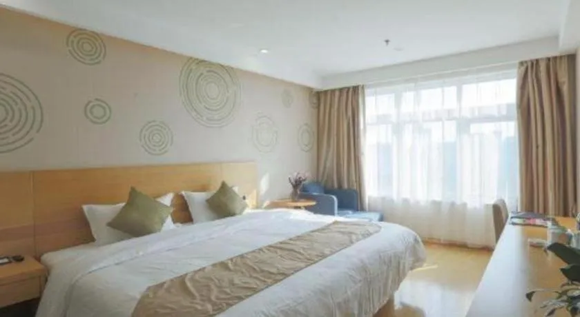 Bed in GreenTree Inn Zhangjiagang Yangshe Old Street Stadium