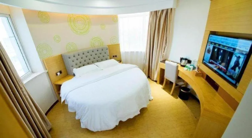 Bed in GreenTree Inn Zhangjiagang Yangshe Old Street Stadium