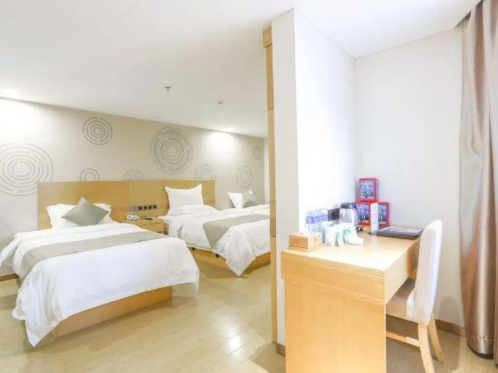 Bed in GreenTree Inn Zhangjiagang Yangshe Old Street Stadium