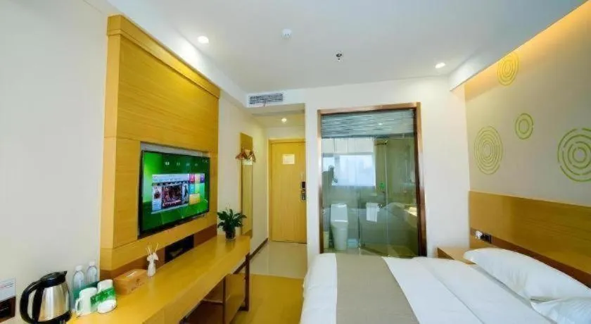 Bed in GreenTree Inn Zhangjiagang Yangshe Old Street Stadium