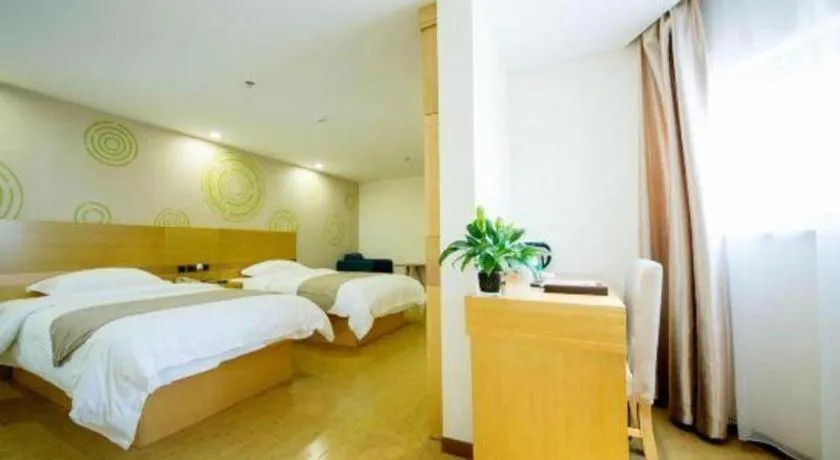 Bed in GreenTree Inn Zhangjiagang Yangshe Old Street Stadium