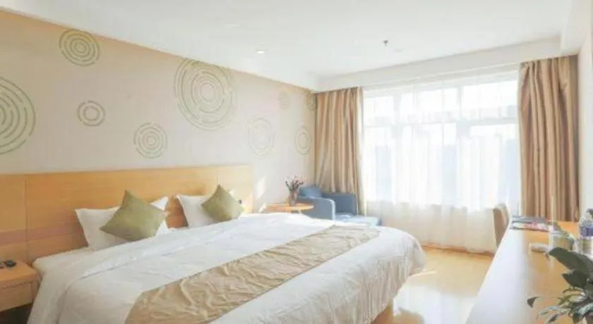 Bed in GreenTree Inn Zhangjiagang Yangshe Old Street Stadium