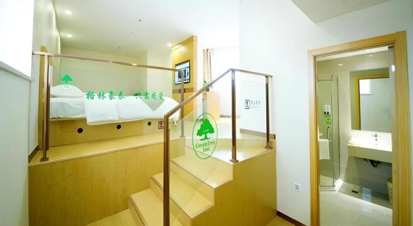 Bed in GreenTree Inn Zhangjiagang Yangshe Old Street Stadium