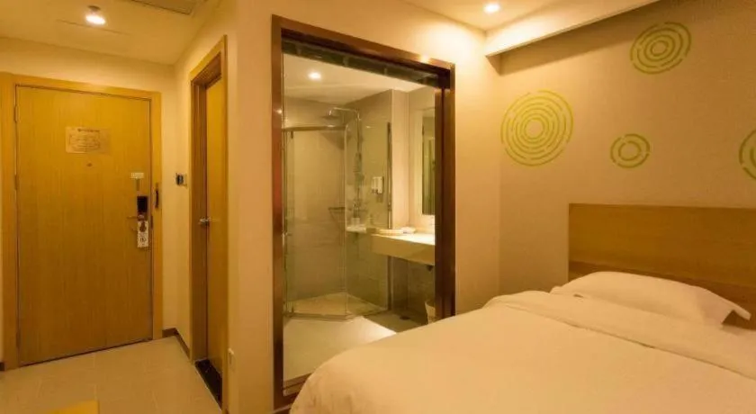 Bed in GreenTree Inn Zhangjiagang Yangshe Old Street Stadium