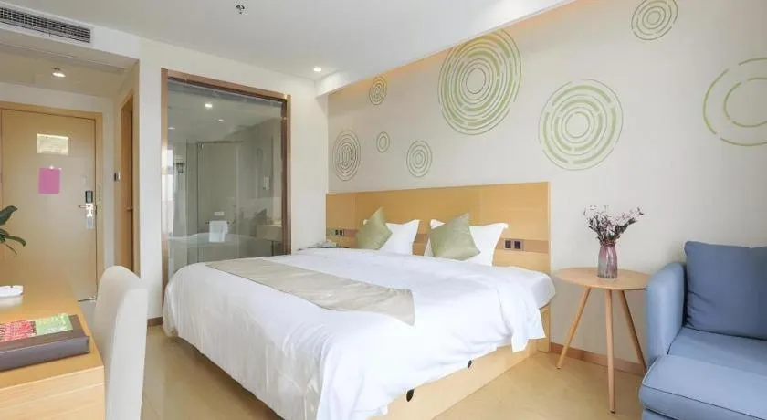 Bed in GreenTree Inn Zhangjiagang Yangshe Old Street Stadium