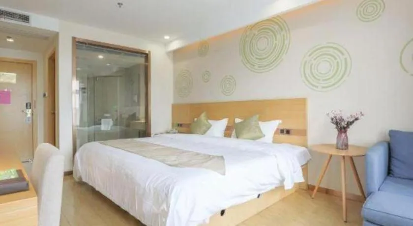 Bed in GreenTree Inn Zhangjiagang Yangshe Old Street Stadium