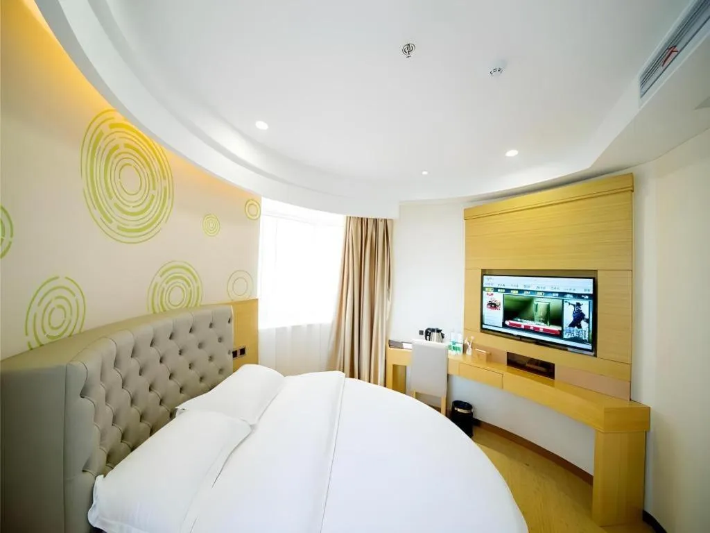 Bed in GreenTree Inn Zhangjiagang Yangshe Old Street Stadium