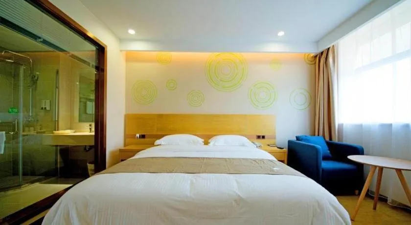 Bed in GreenTree Inn Zhangjiagang Yangshe Old Street Stadium