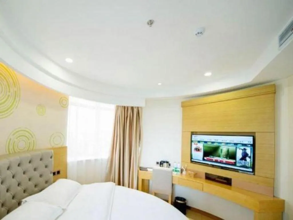 Bed in GreenTree Inn Zhangjiagang Yangshe Old Street Stadium