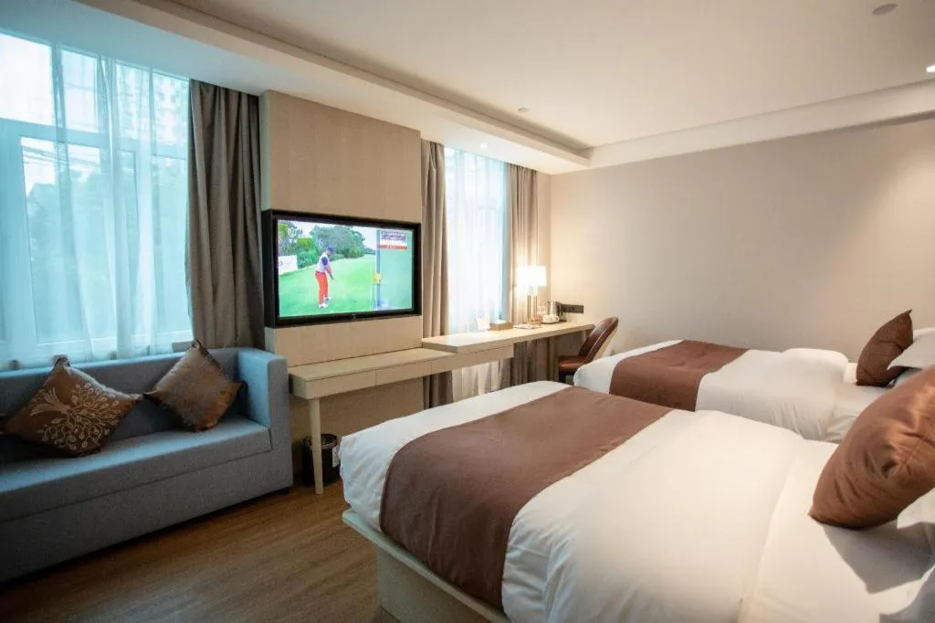 Bed in GYA Shanghai Jiangpu Hotel