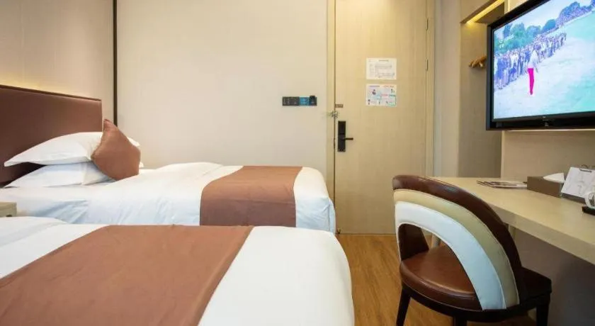 Bed in GYA Shanghai Jiangpu Hotel