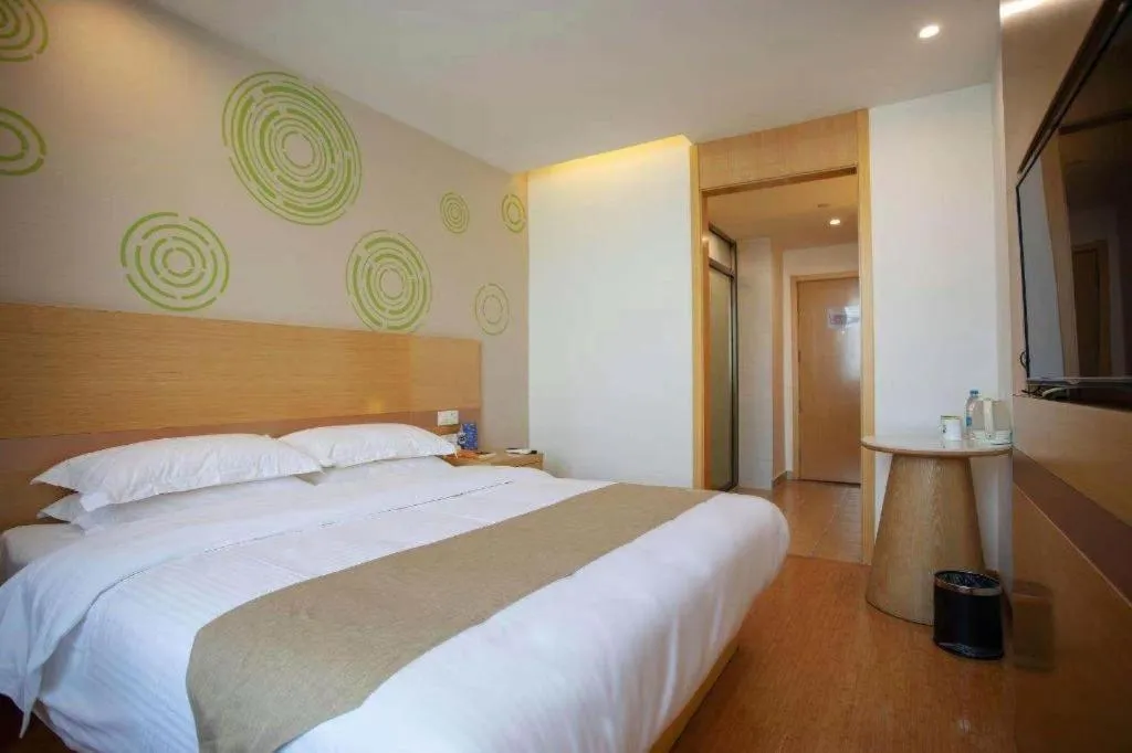 Bed in GreenTree Inn Shanghai National Convention and Exhibition Center Huaxiang Road