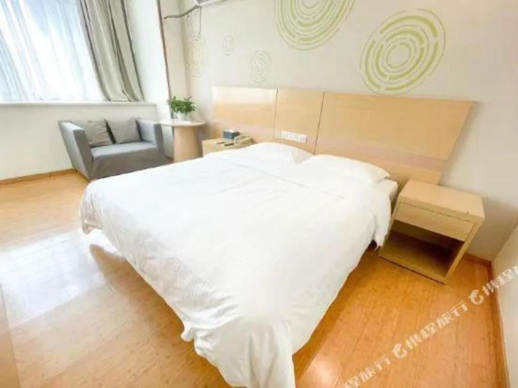 Bed in GreenTree Inn Shanghai National Convention and Exhibition Center Huaxiang Road