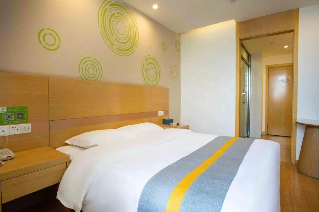 Bed in GreenTree Inn Shanghai National Convention and Exhibition Center Huaxiang Road