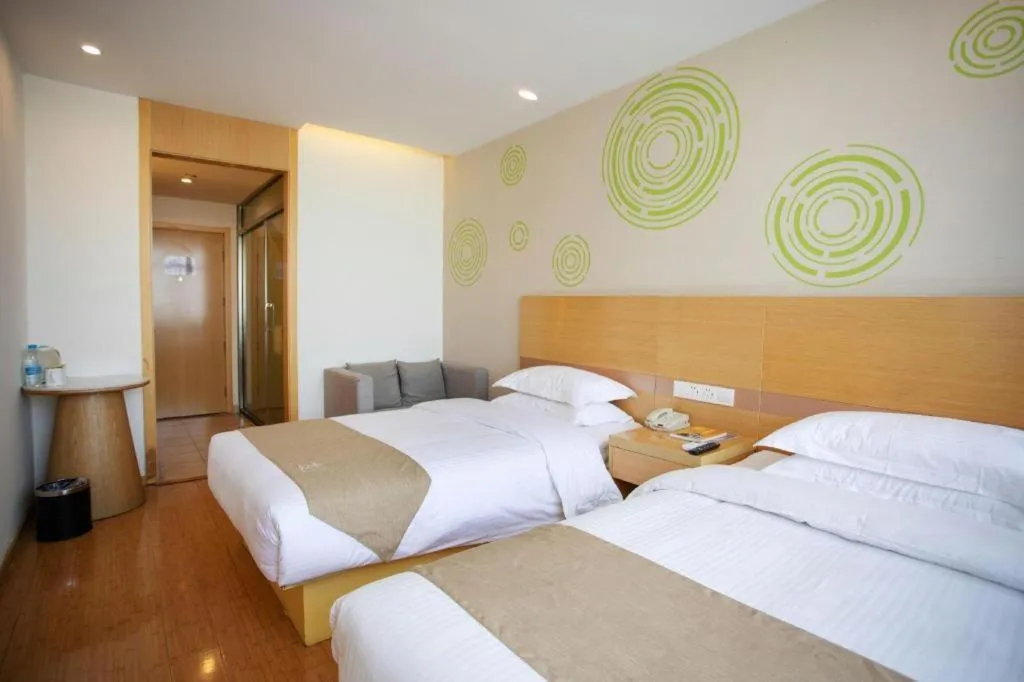 Bed in GreenTree Inn Shanghai National Convention and Exhibition Center Huaxiang Road
