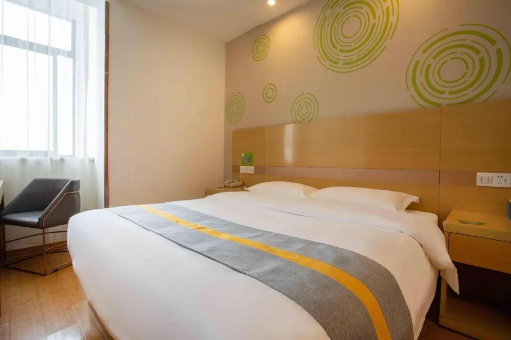 Bed in GreenTree Inn Shanghai National Convention and Exhibition Center Huaxiang Road