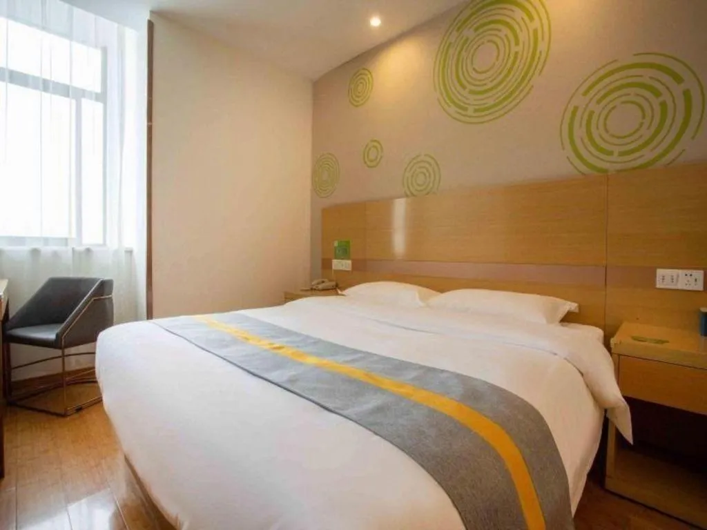 Bed in GreenTree Inn Shanghai National Convention and Exhibition Center Huaxiang Road