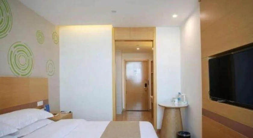 Bed in GreenTree Inn Shanghai National Convention and Exhibition Center Huaxiang Road