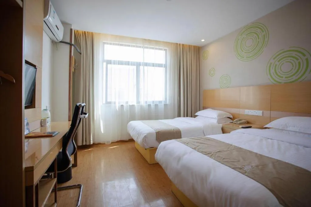 Bed in GreenTree Inn Shanghai National Convention and Exhibition Center Huaxiang Road