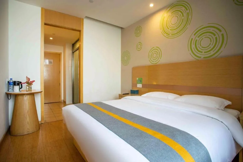 Bed in GreenTree Inn Shanghai National Convention and Exhibition Center Huaxiang Road