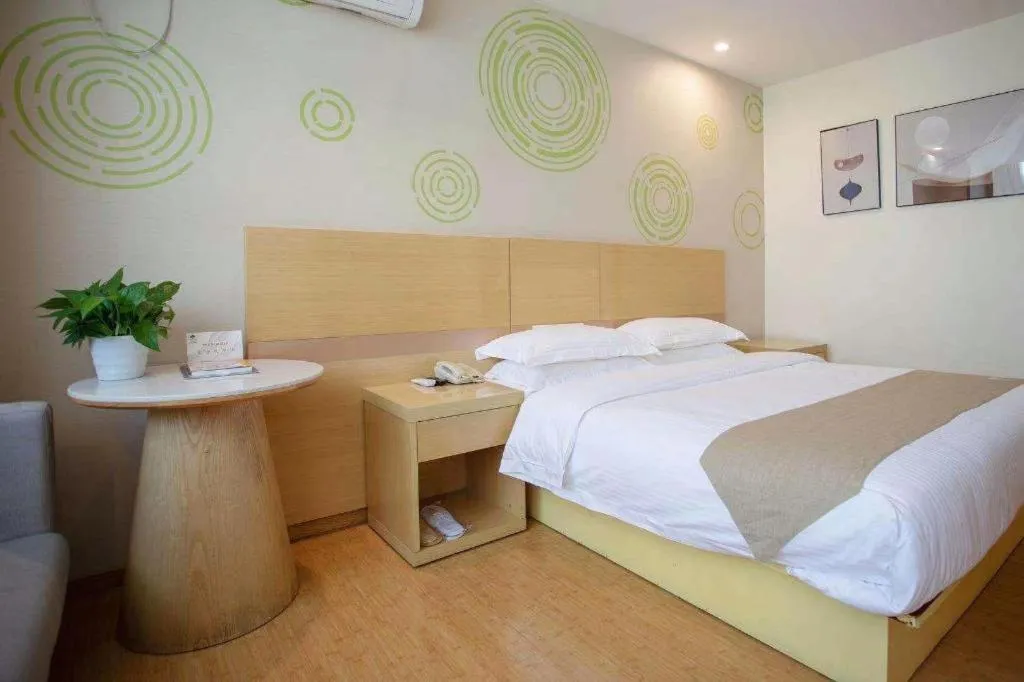 Bed in GreenTree Inn Shanghai National Convention and Exhibition Center Huaxiang Road