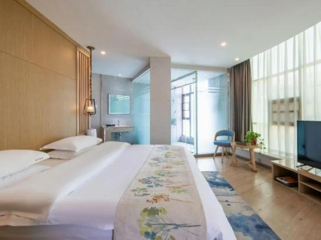 Bed in VX Dali Erhai Park Seascape Hotel