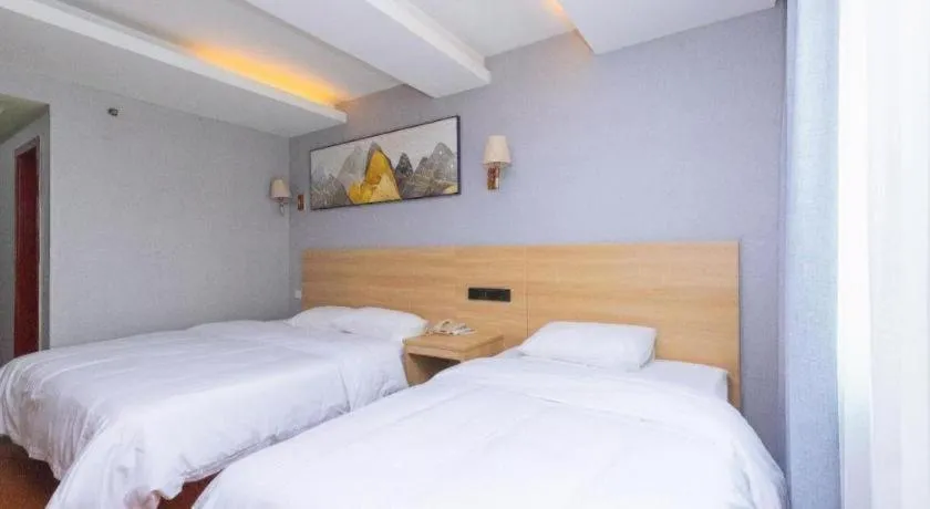 Bed in GreenTree Inn Chongqing Longhu Times Tianjie Xietaizi Metro Station
