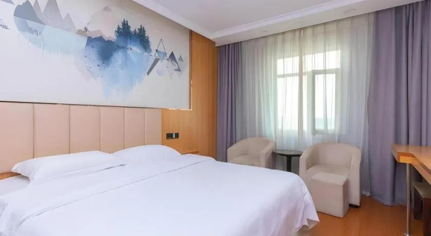 Bed in GreenTree Inn Chongqing Longhu Times Tianjie Xietaizi Metro Station