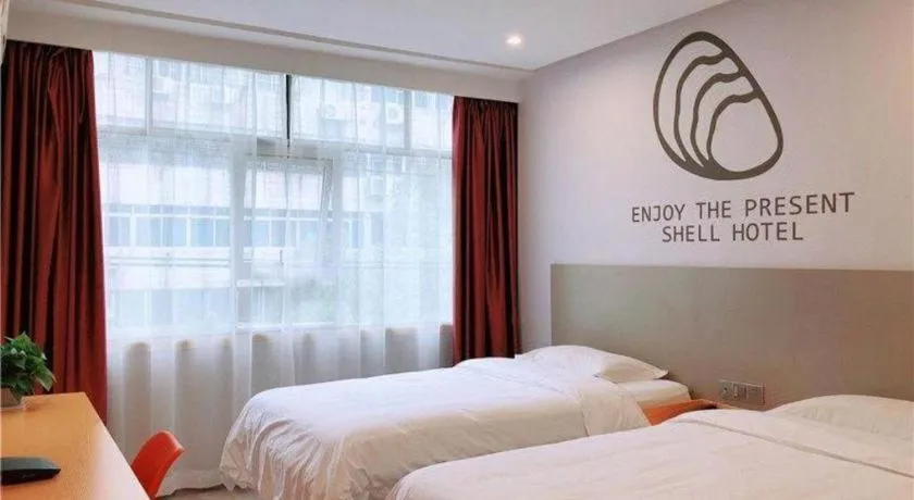 Bed in Shell Ganzhou Central Theme Hotel