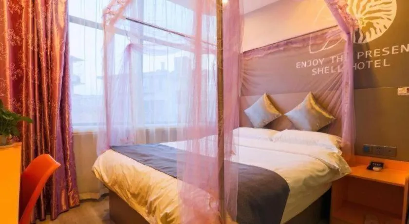 Bed in Shell Ganzhou Central Theme Hotel