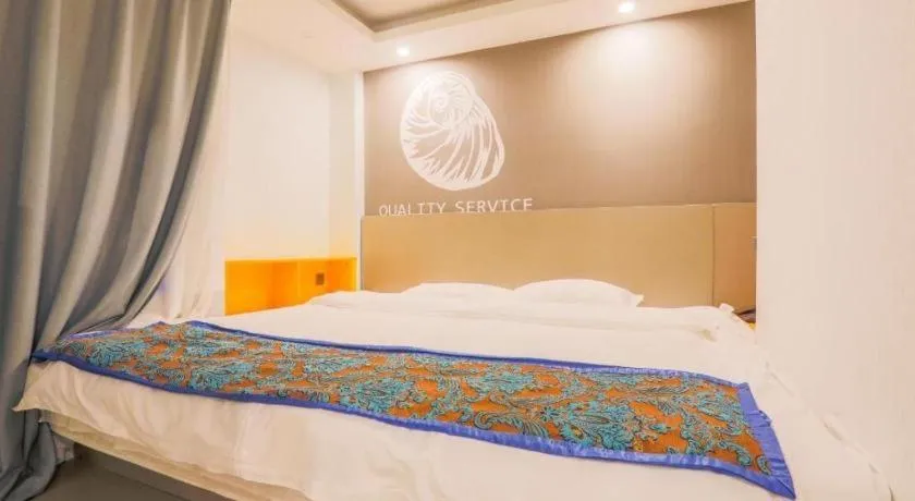 Bed in Shell Ganzhou Central Theme Hotel