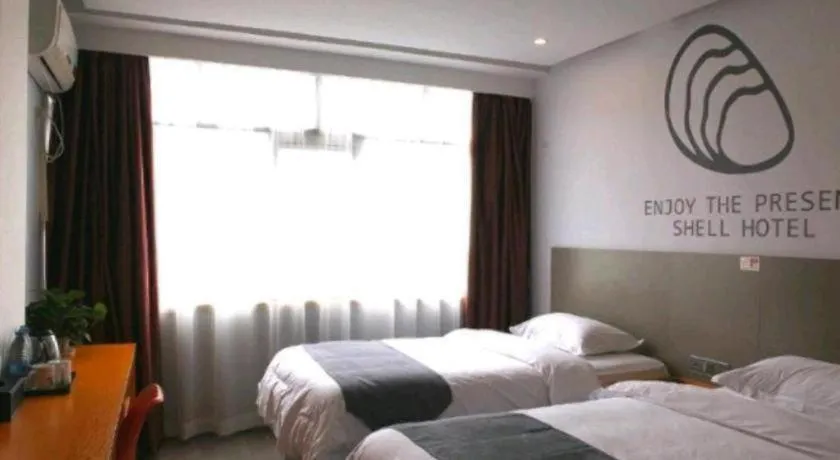 Bed in Shell Ganzhou Central Theme Hotel