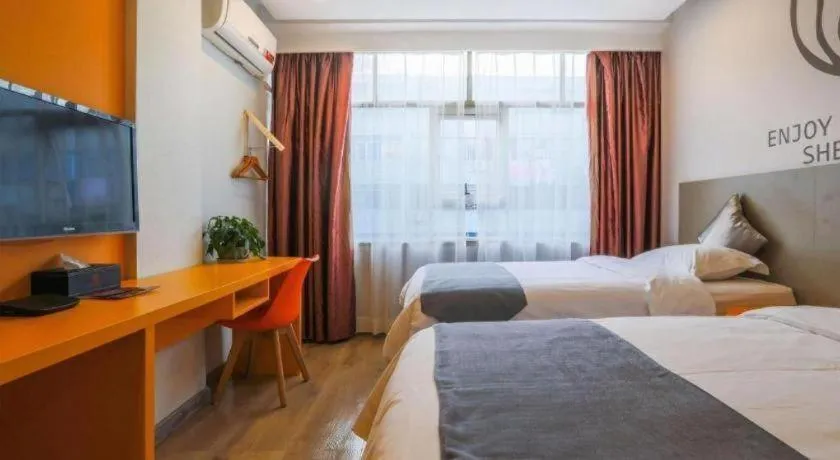 Bed in Shell Ganzhou Central Theme Hotel