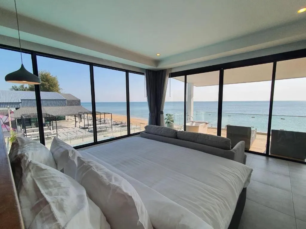 Bed in Rattana Pura Beach Resort