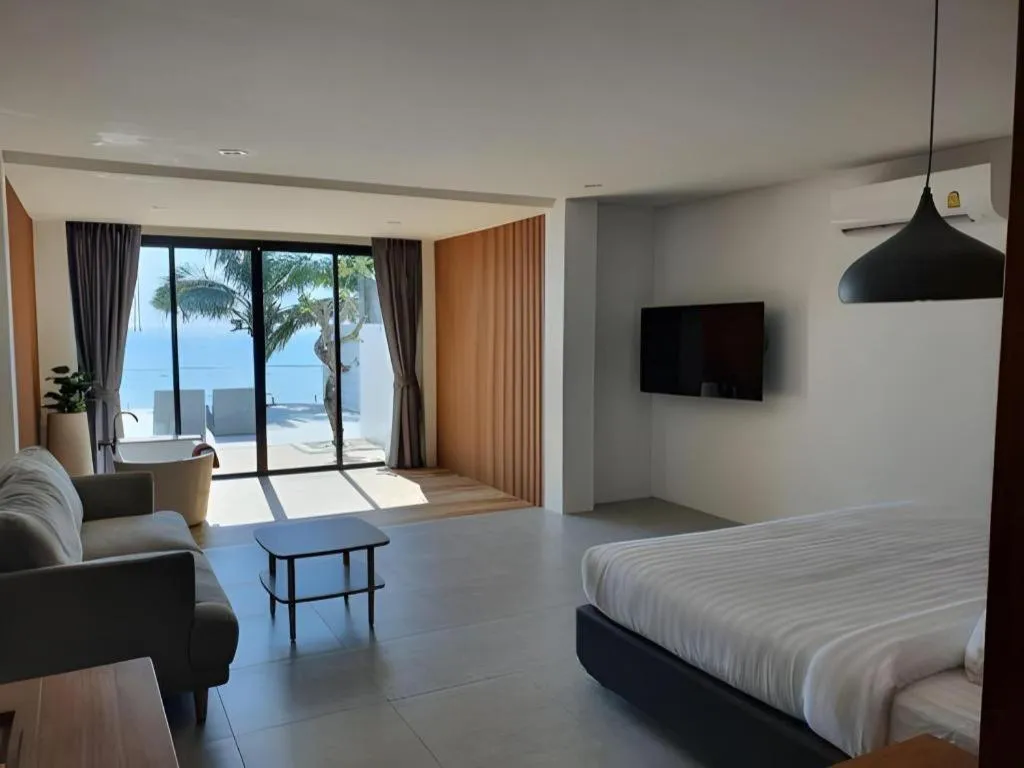 Bed in Rattana Pura Beach Resort