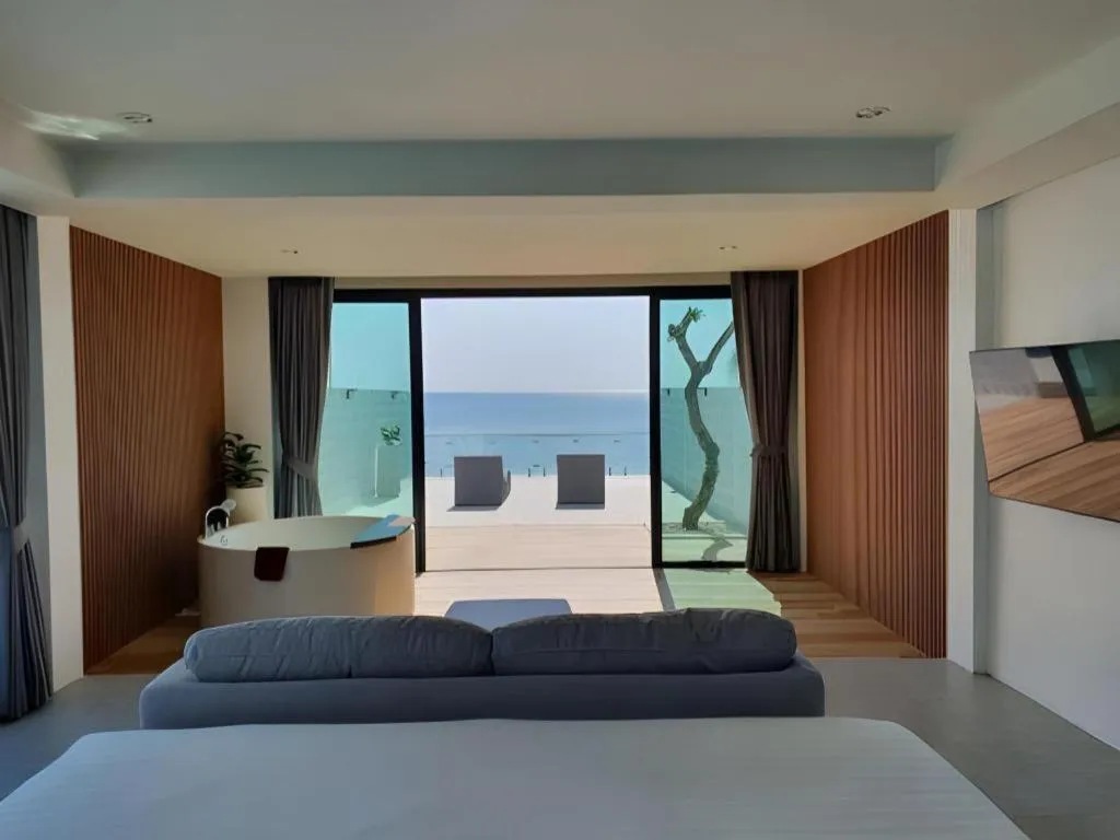 Bed in Rattana Pura Beach Resort