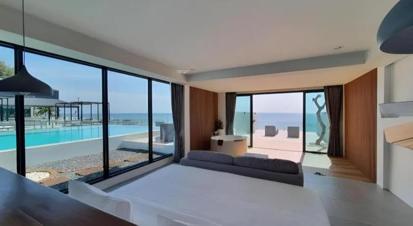 Bed in Rattana Pura Beach Resort