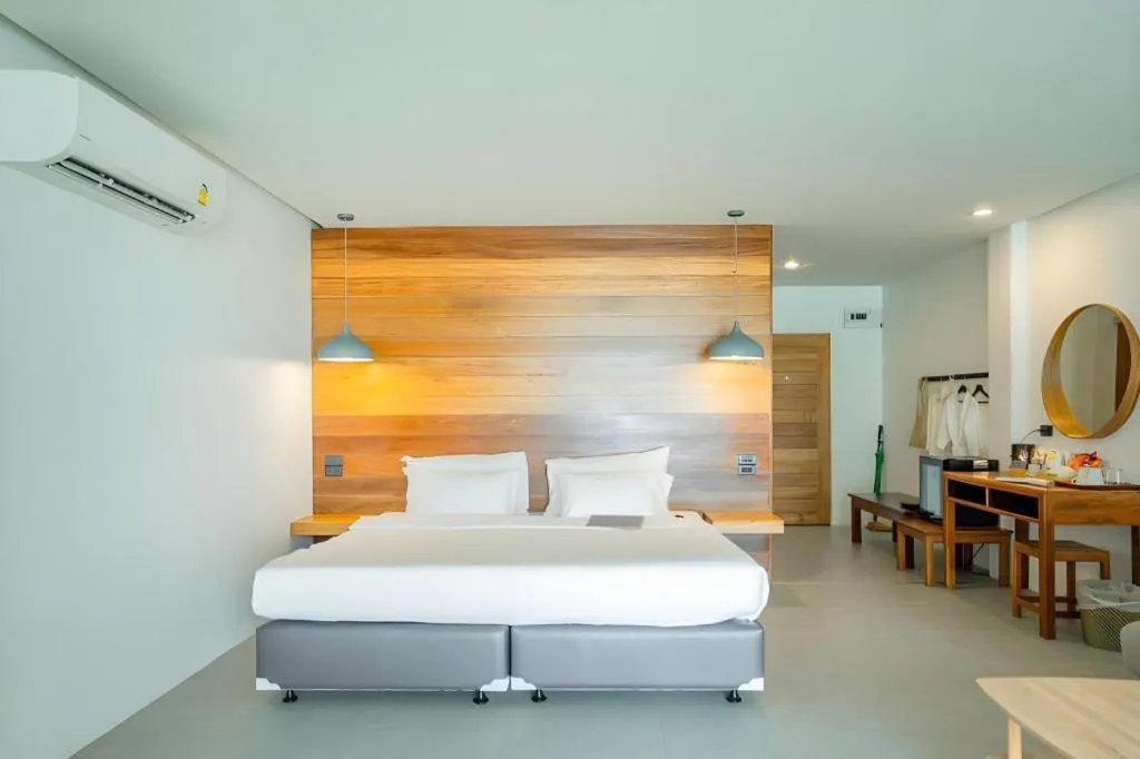 Bed in Rattana Pura Beach Resort