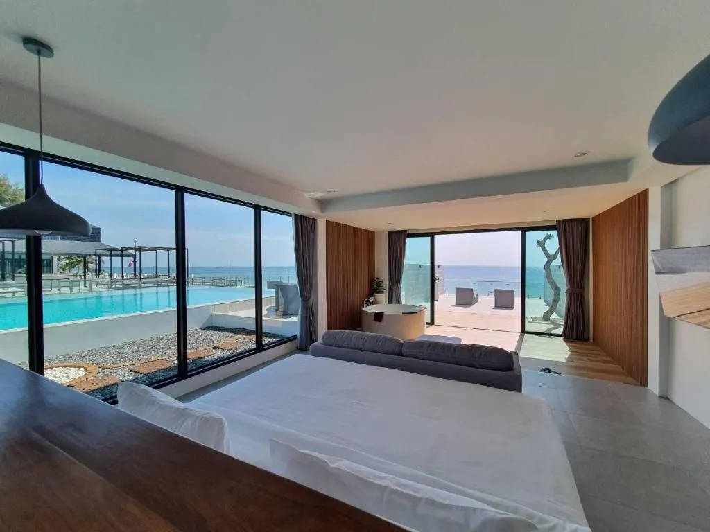 Bed in Rattana Pura Beach Resort