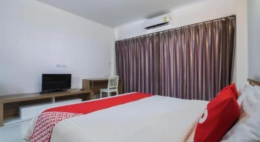 Bed in Super OYO 662 Malee Bunga Hotel