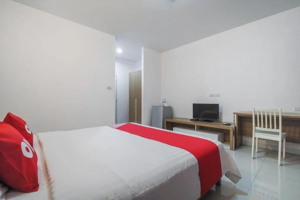 Bed in Super OYO 662 Malee Bunga Hotel