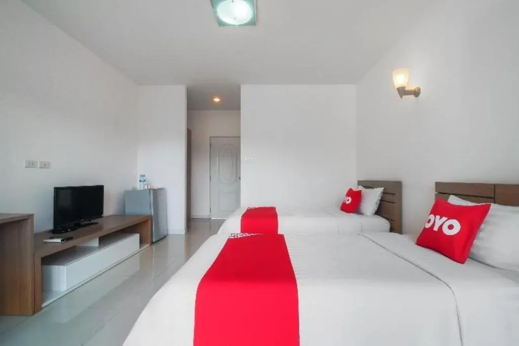 Bed in Super OYO 662 Malee Bunga Hotel