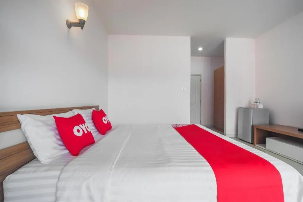 Bed in Super OYO 662 Malee Bunga Hotel