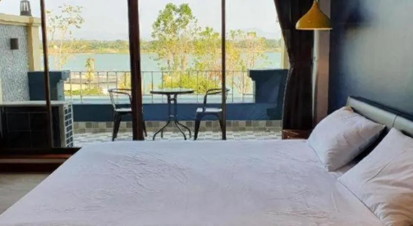 Bed in THE S VILLAS HOTEL