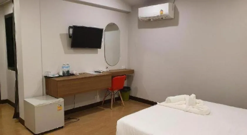 Bed in THE S VILLAS HOTEL