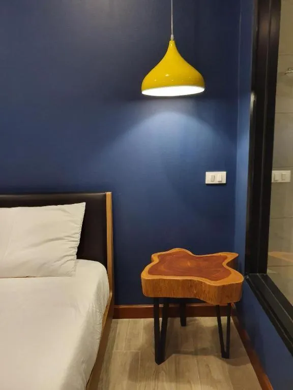 Bed in THE S VILLAS HOTEL