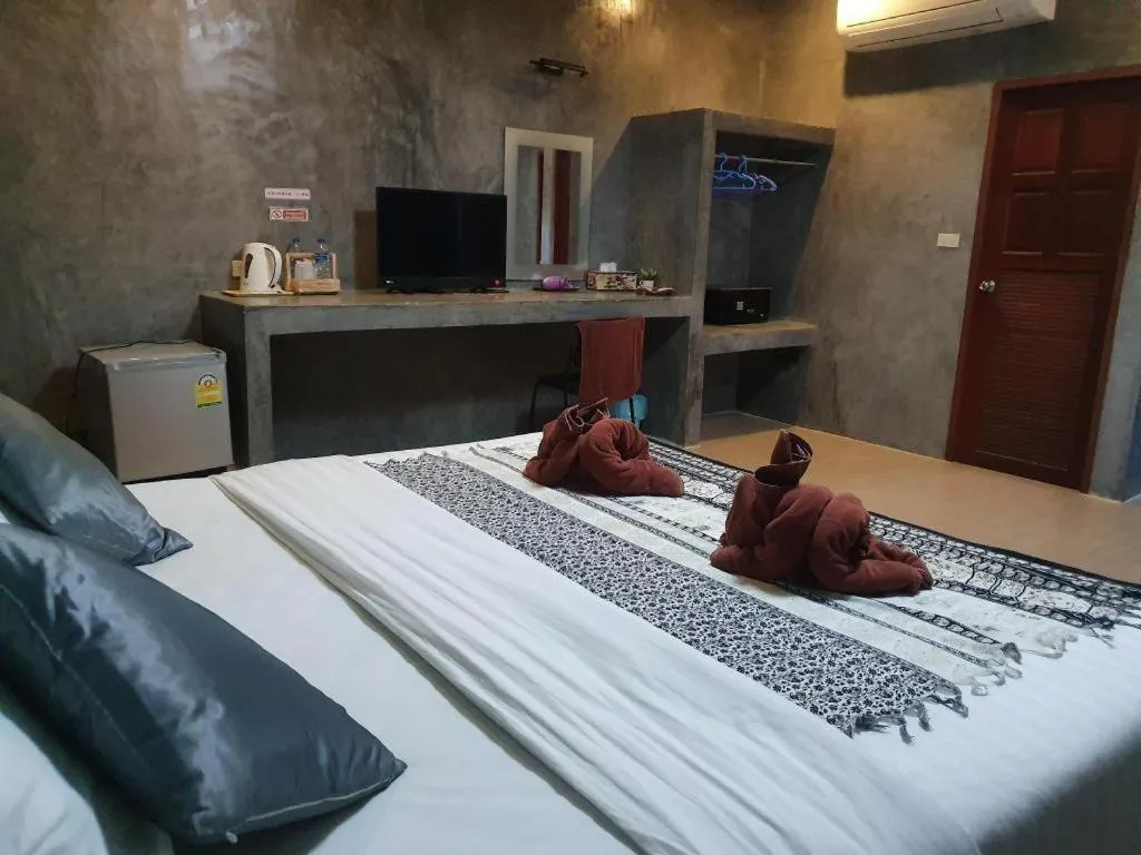 Bed in Saikaew Boutique Hotel